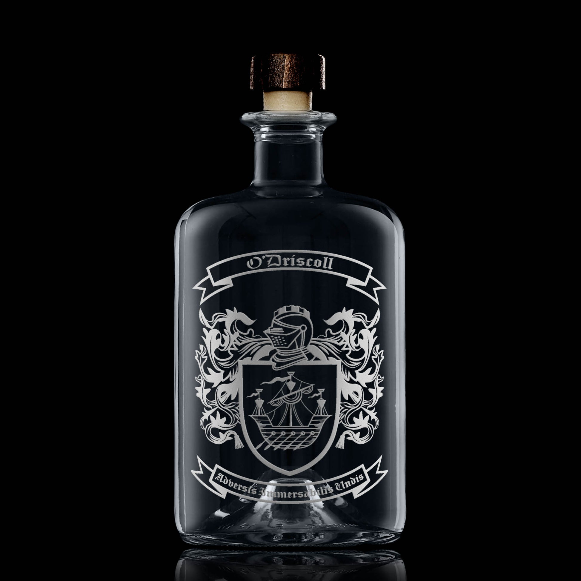 Heraldic coat of  arms engraved on apothecary decanter with stopper — balanced placement, satin finish.