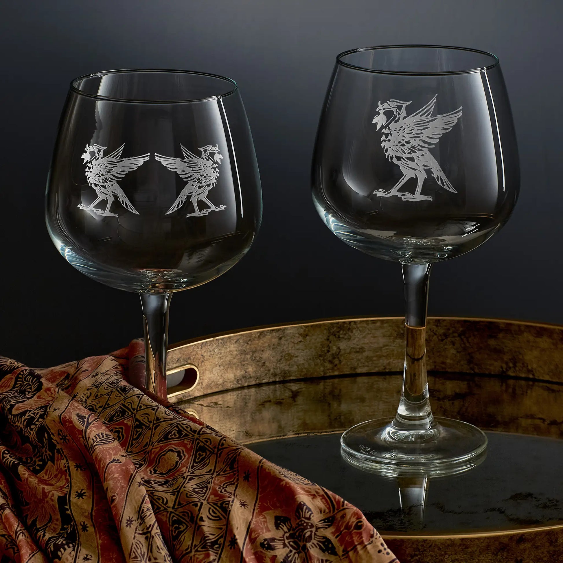 Two gin glasses engraved with Liverpool's Liverbird's, Bella and Bertie