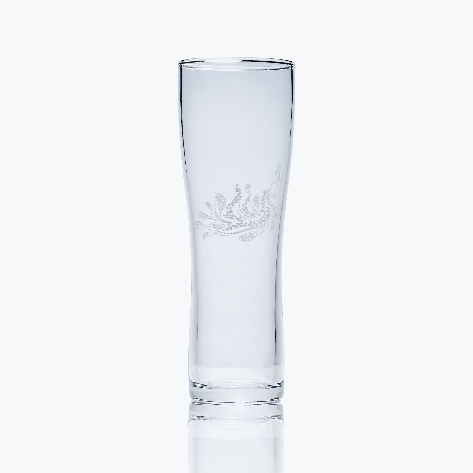 engraved craft beer pint glass etched with a peacock 