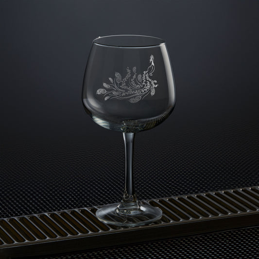 engraved balloon gin glass etched with a peacock 