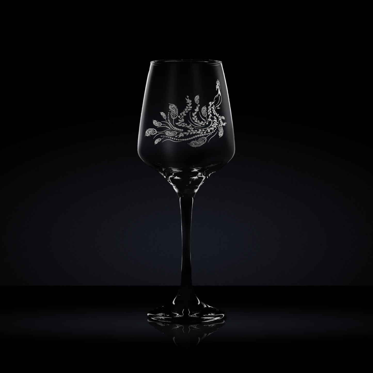 engraved wine glass etched with a peacock bird