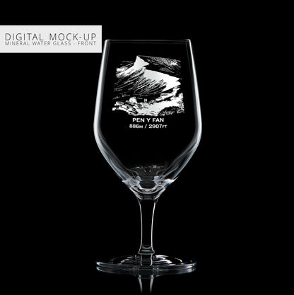 Mock-up illustration of a mineral water glass with engraved Pen Y Fan mountain design and personalised text on a black background