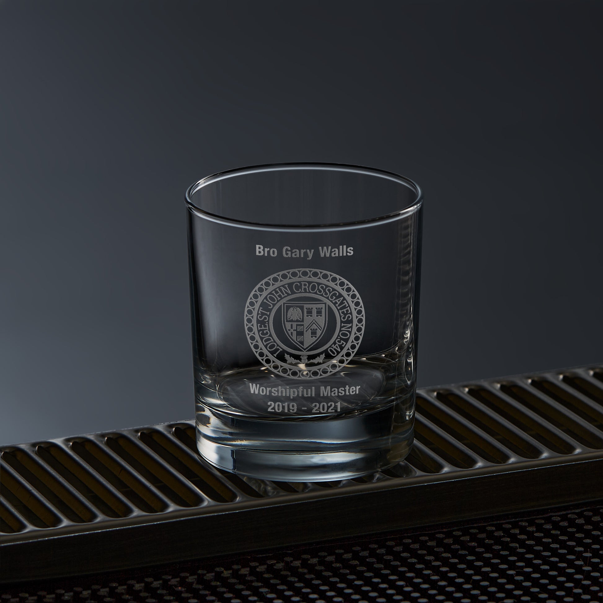 whisky tumbler engraved with a personalised message and masonic lodge design