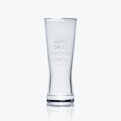 pilsner pint glass engraved withpink floyd's the wall and a personalised message