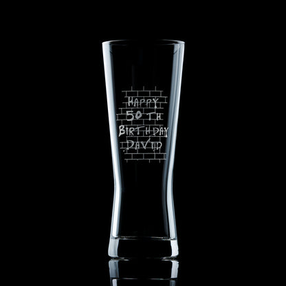 pilsner pint glass engraved withpink floyd's the wall and a personalised message