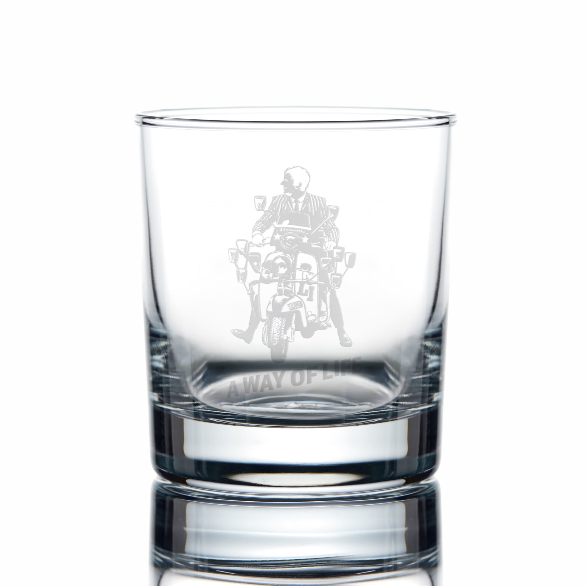 Clear glass with engraved design of Jimmy on his Lambretta Li and text, on a white background