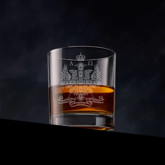 Engraved whisky glass with Red Cross of Constantine double-headed eagle on black background