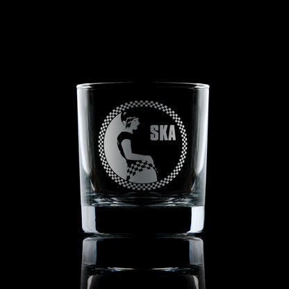 Engraved whisky glass with a Rude Girl in checkerboard skirt and Ska text – circular design with checker border in 2 Tone style