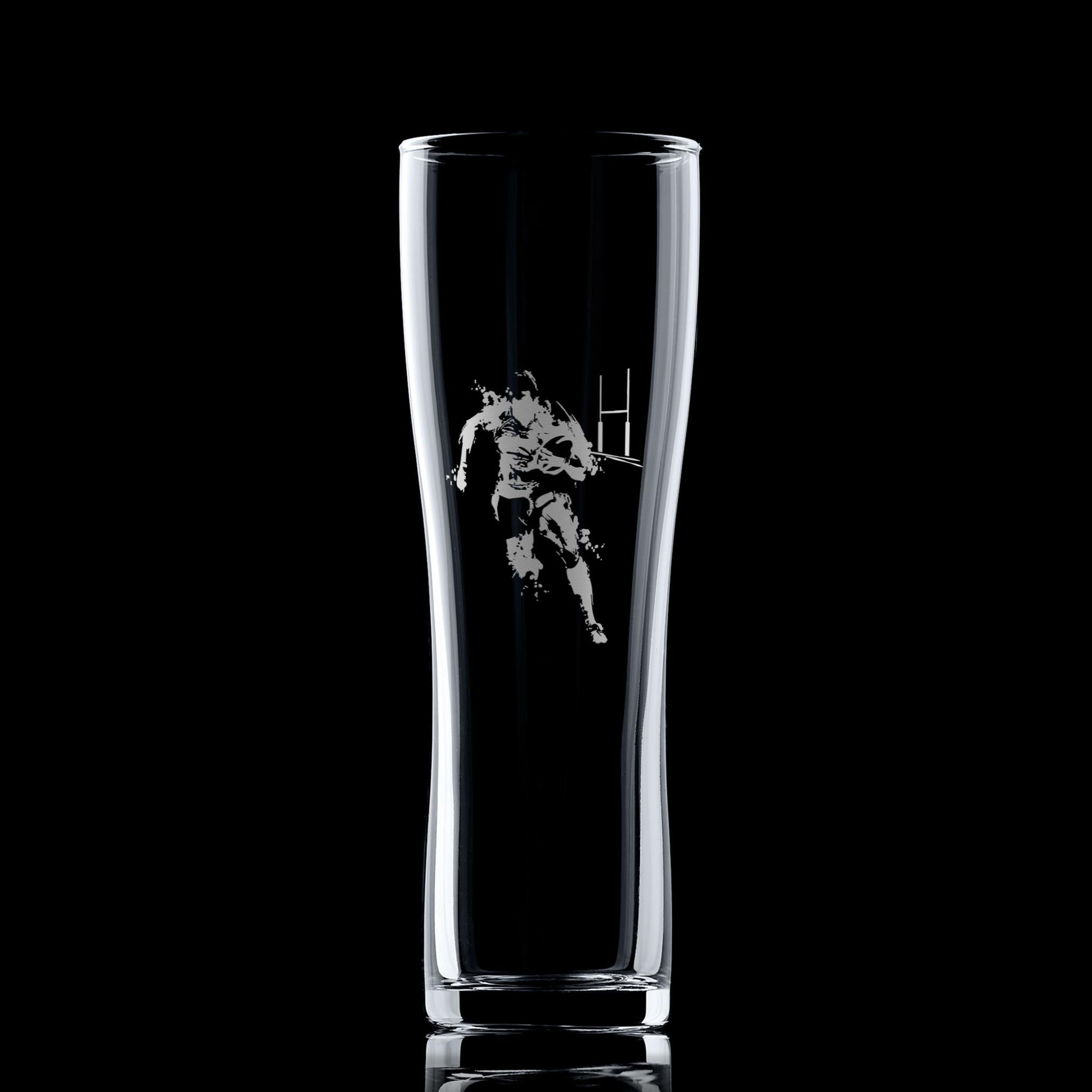 Clear glass with a black and white graphic of a rugby player on a black background