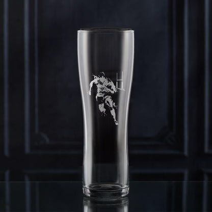 Pint glass engraved with rugby player, ball and goalposts