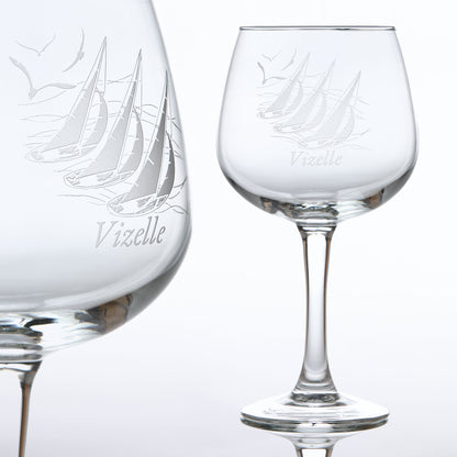Sailing gin glass featuring an inricate engraving of boats and seabirds, personalised with the name of the recipients yacht