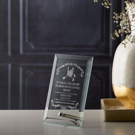 Teacher appreciation glass plaque with engraved text on a dark background