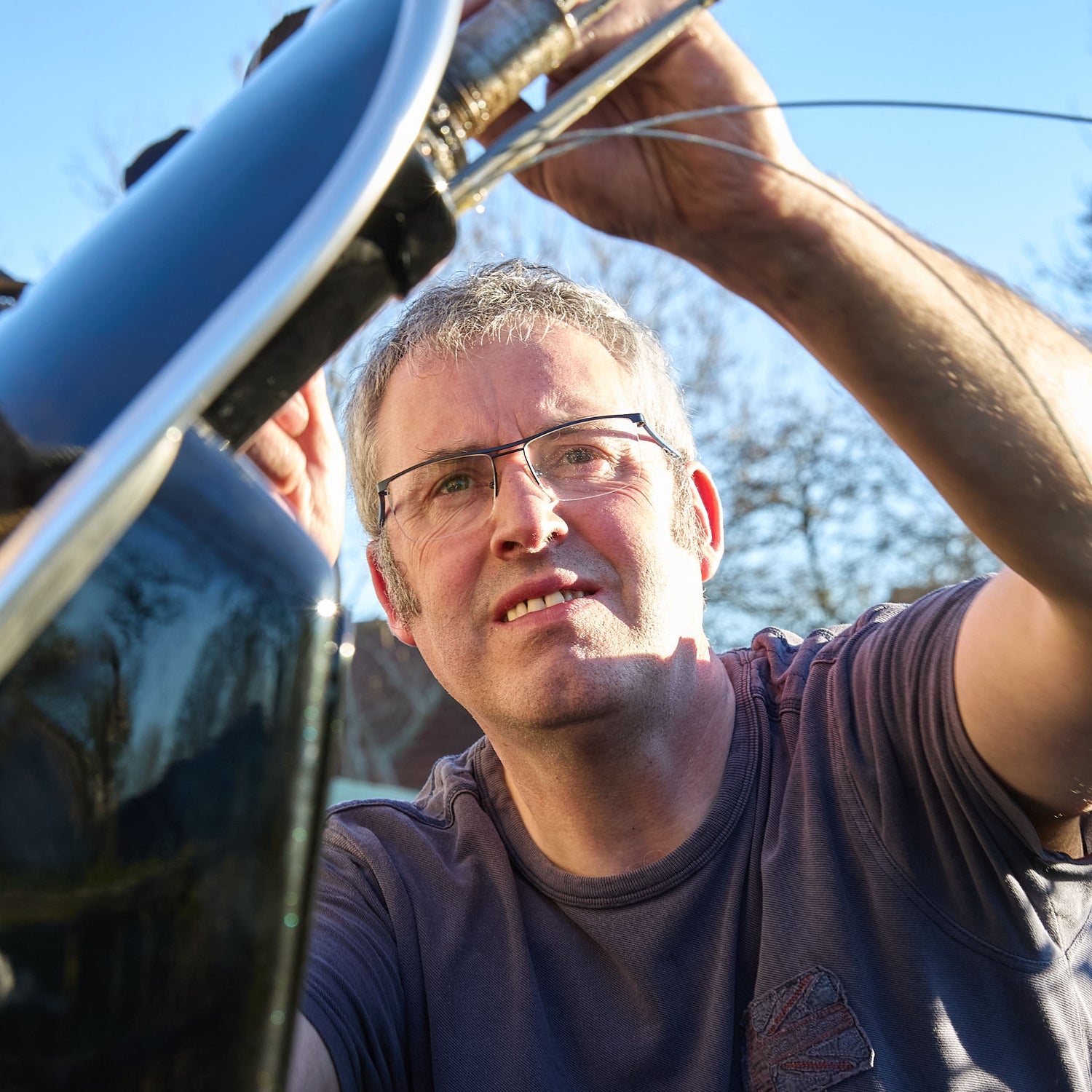 Man rebuilding a vespa scooter