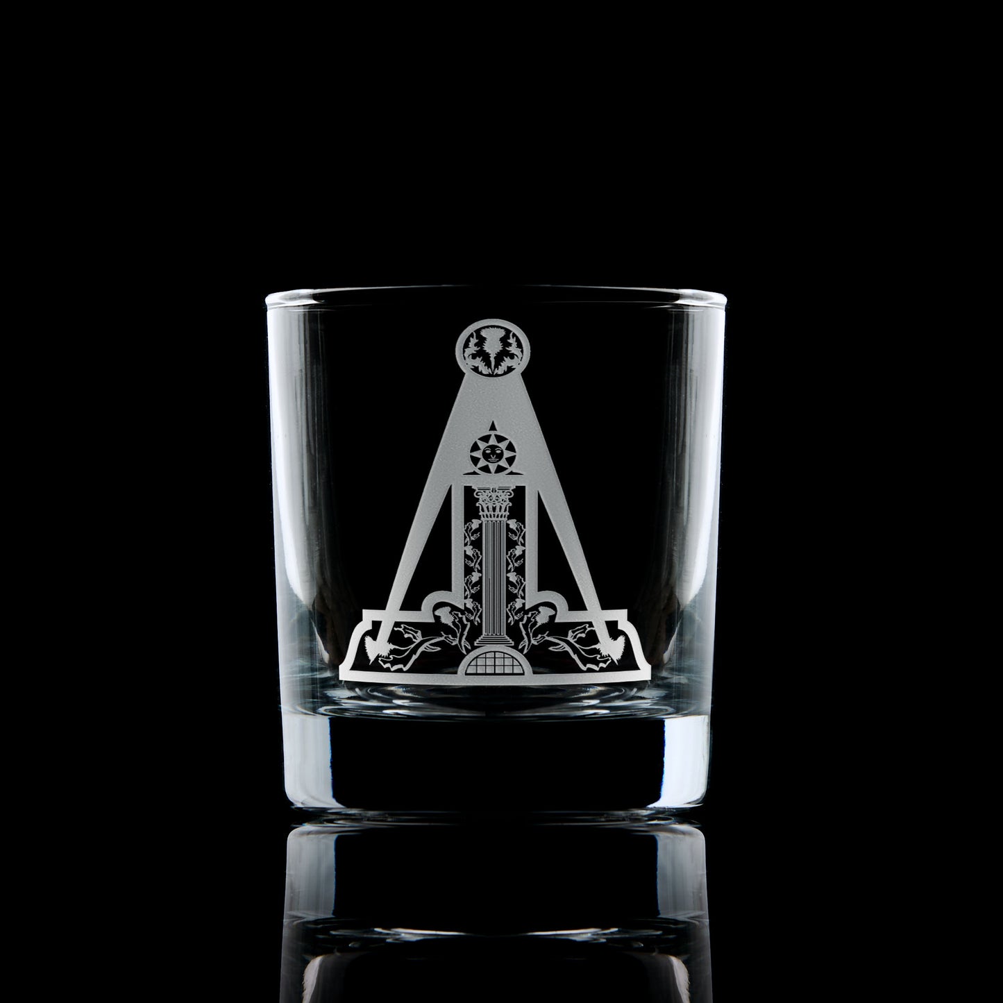 Scottish Constitution Almoner whisky glass engraved with Craft jewel, photographed on black background