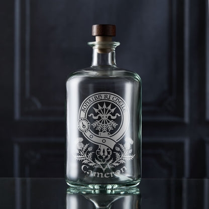 Scottish Clan Crest whisky decanter in an apothecary style engraved with the Cameron family's clan surrounded by thistles