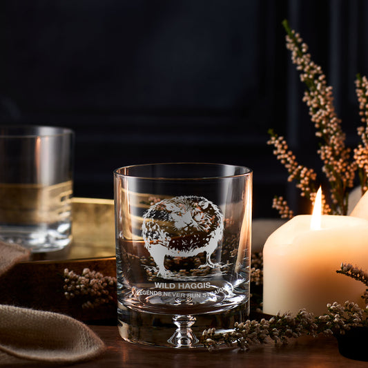 Scottish whisky glass engraved with a wild haggis and the words legends never run straight