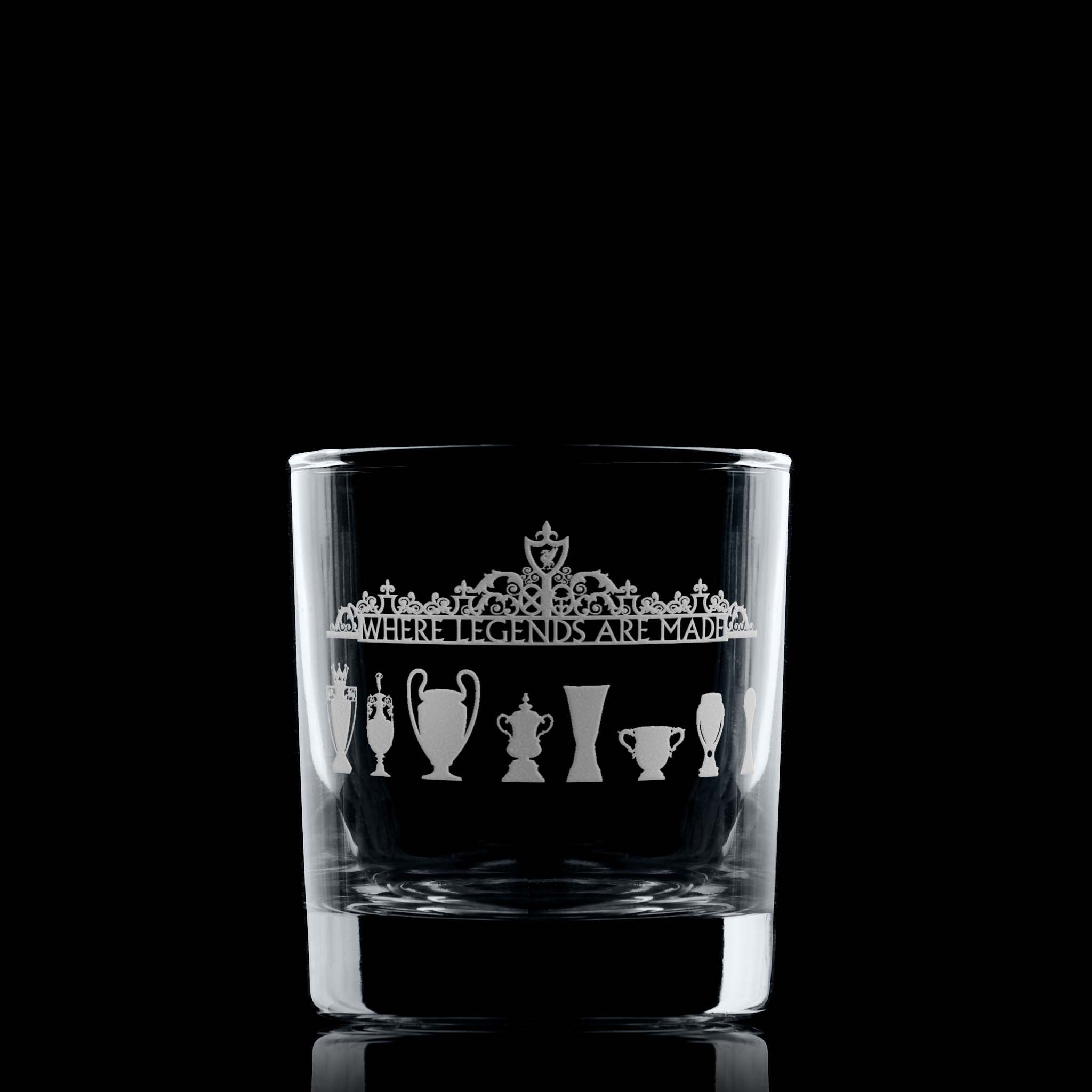 Engraved whisky glass featuring football trophy silhouettes and Shankly Gates outside of Liverpool's Anfield stadium