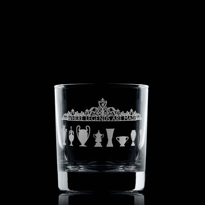 Engraved whisky glass featuring football trophy silhouettes and Shankly Gates outside of Liverpool's Anfield stadium