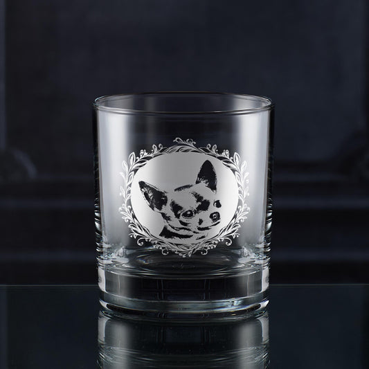Whisky glass with engraved shorthaired chihuahua portrait in circular frame with leafy garland
