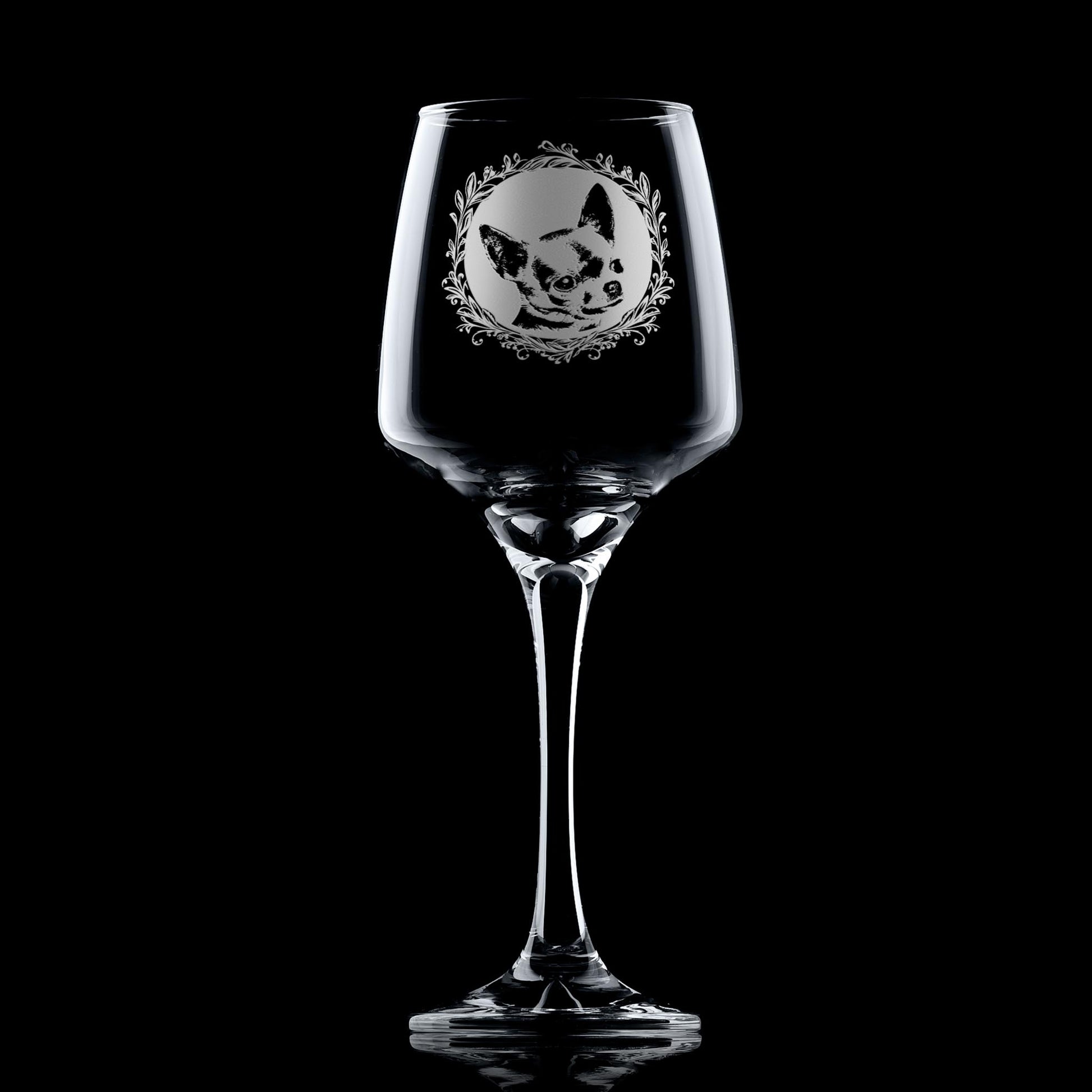 Wine glass with engraved short haired chihuahua portrait framed with leafy garland