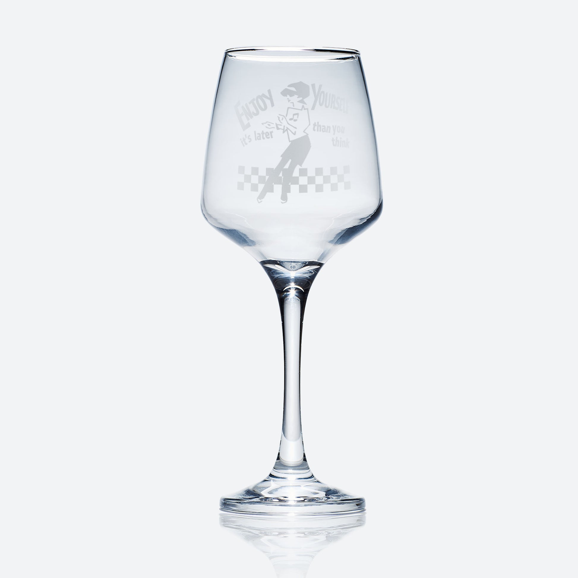 Personalised wine glass engraved with ska and beat girl design on a white background