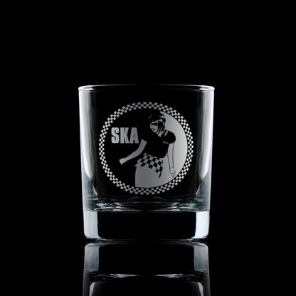 Whisky glass engraved with a Rude Girl in checkerboard skirt and Ska text – circular design with border in 2 Tone style