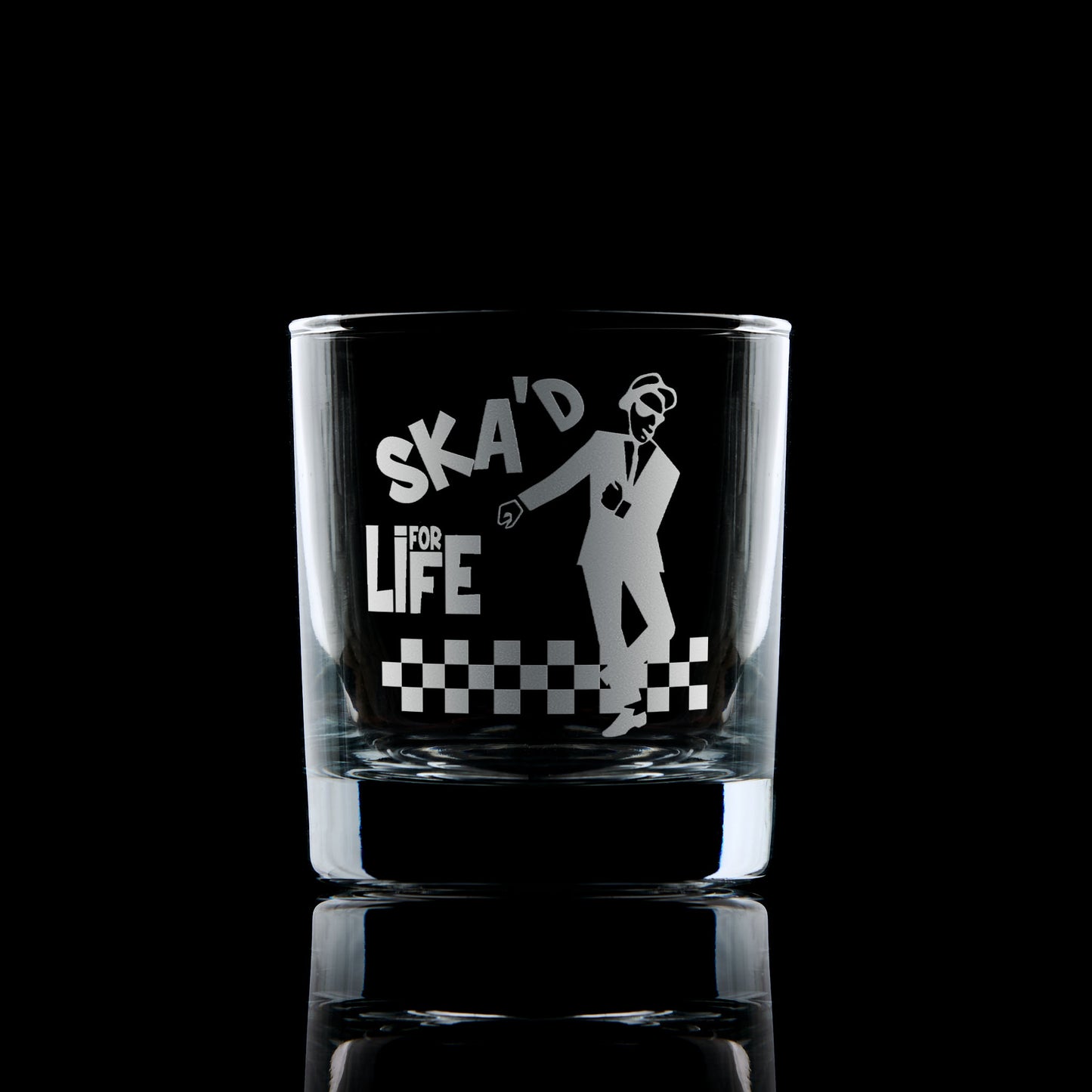 whisky glass engraved with a 2 tone ska design