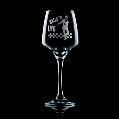 wine glass engraved with a ska design