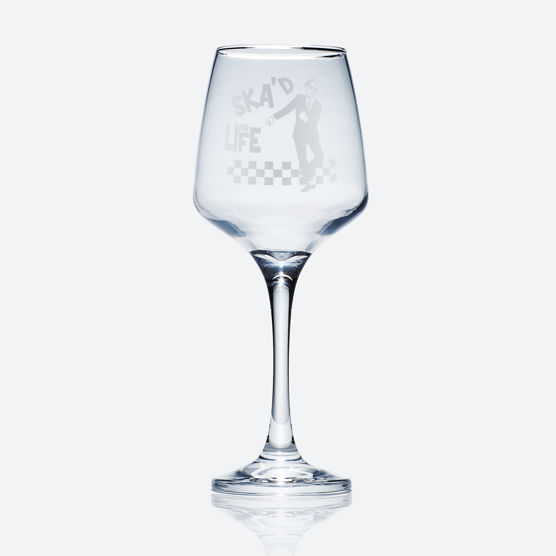 wine glass engraved with a ska design