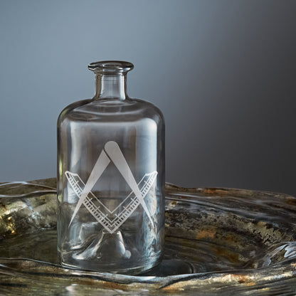 masonic decanter engraved with a master mason's square and compass