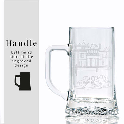 Clear glass tankard with engraved golf clubhouse design on a white background