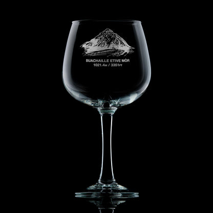 Balloon gin glass engraved with Stob Dearg on Buachaille Etive Mòr, photographed on a black background
