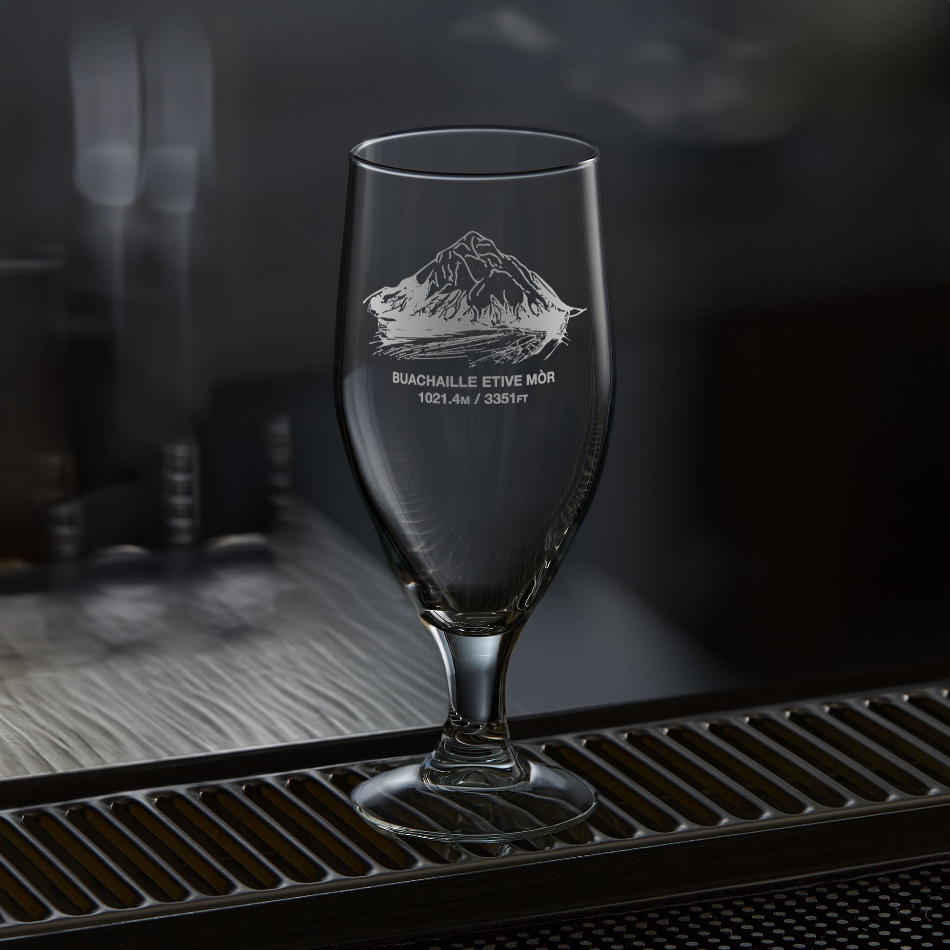 chalice style stemmed beer glass engraved with a scottish mountain in glencoe