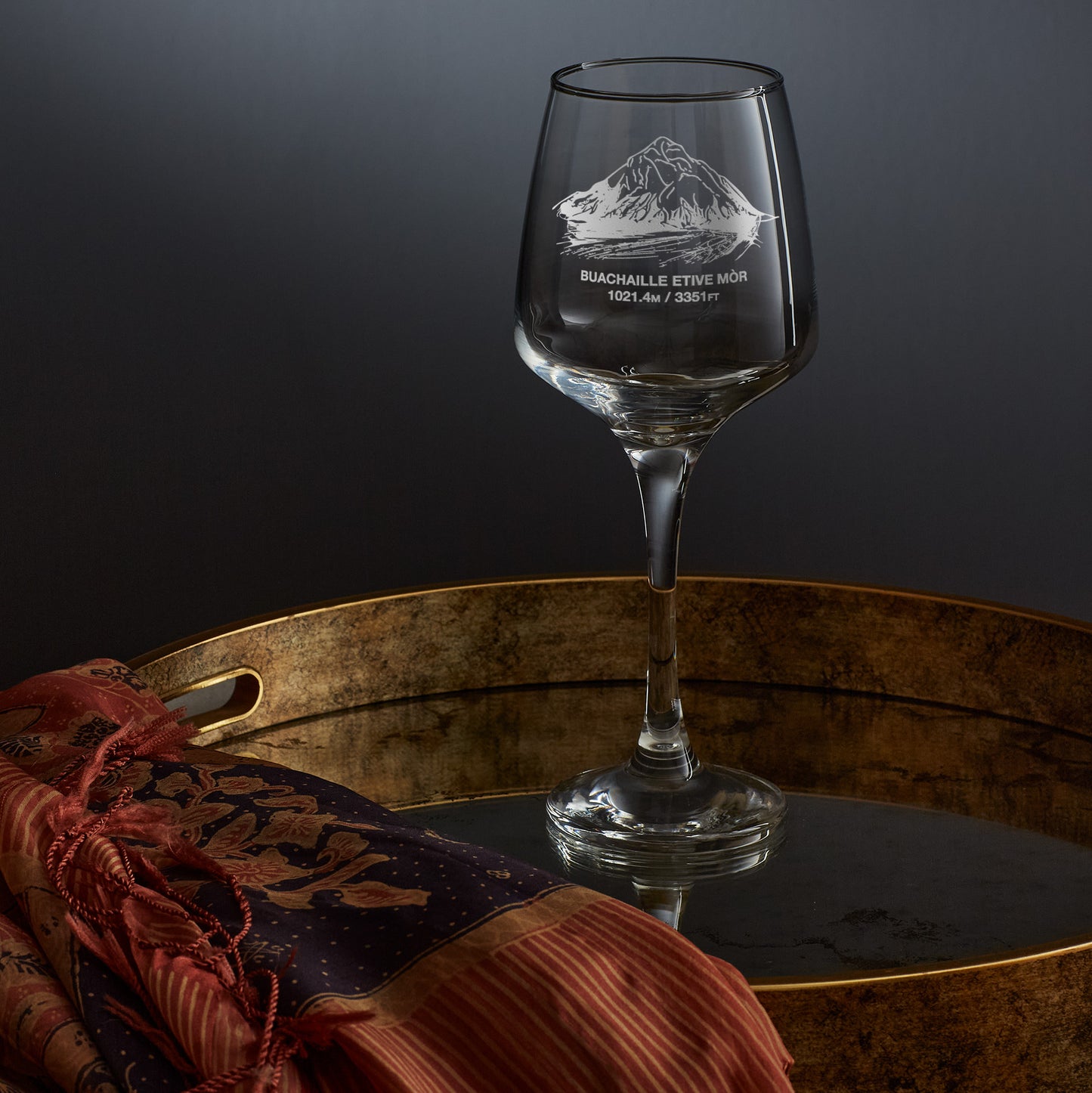 stemmed wine glass engraved with a scottish mountain in glencoe