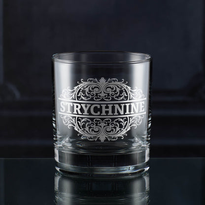Whisky tumbler engraved with an ornate Strychnine poison-label design