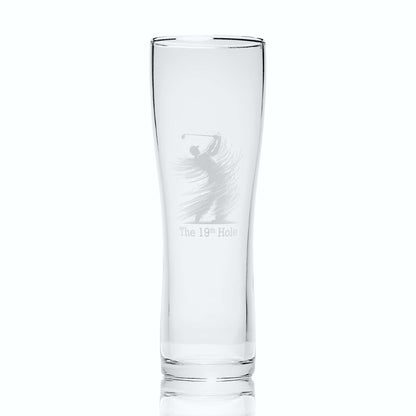 Pint glass with engraved golf club design and text on a white background