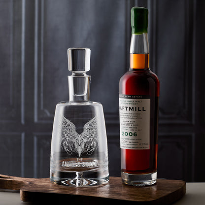 Engraved glass decanter illustrated with The Angels Share and pair of feathered wings