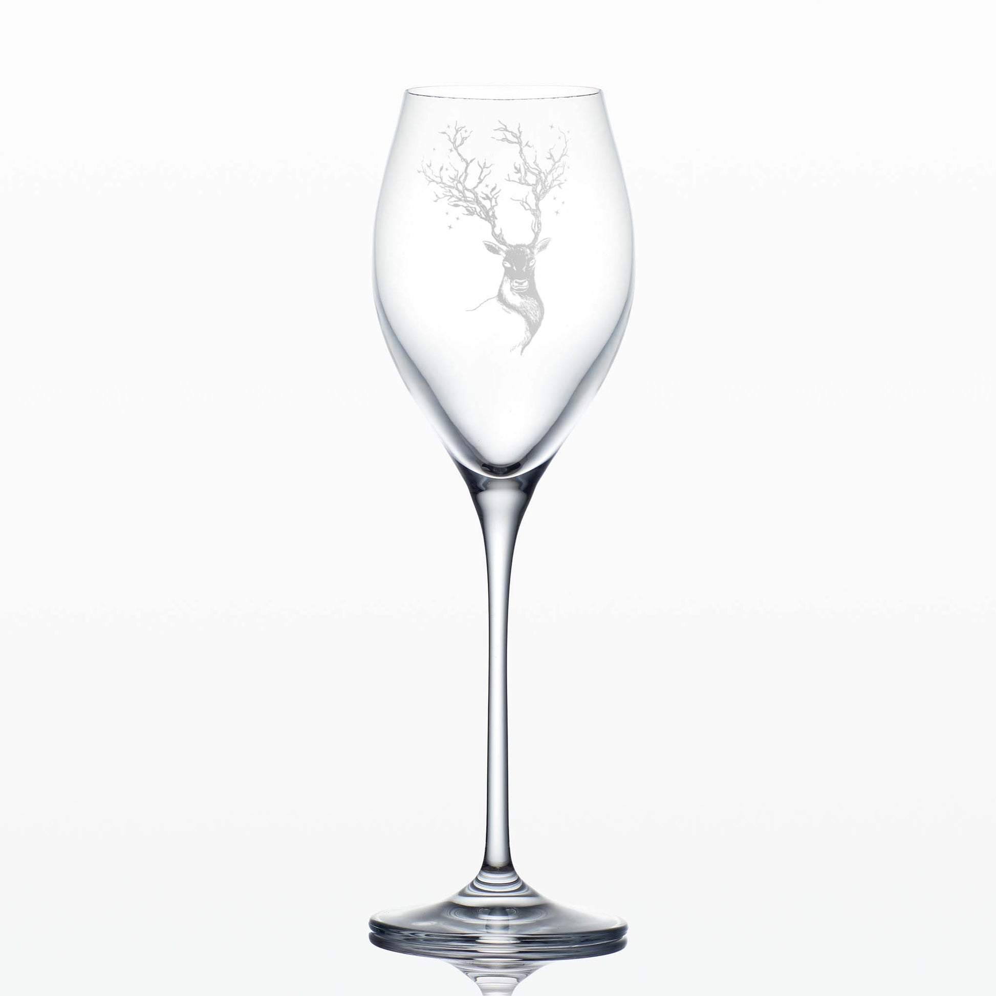 Prosecco wine glass with engraved deer and antlers design on a white background