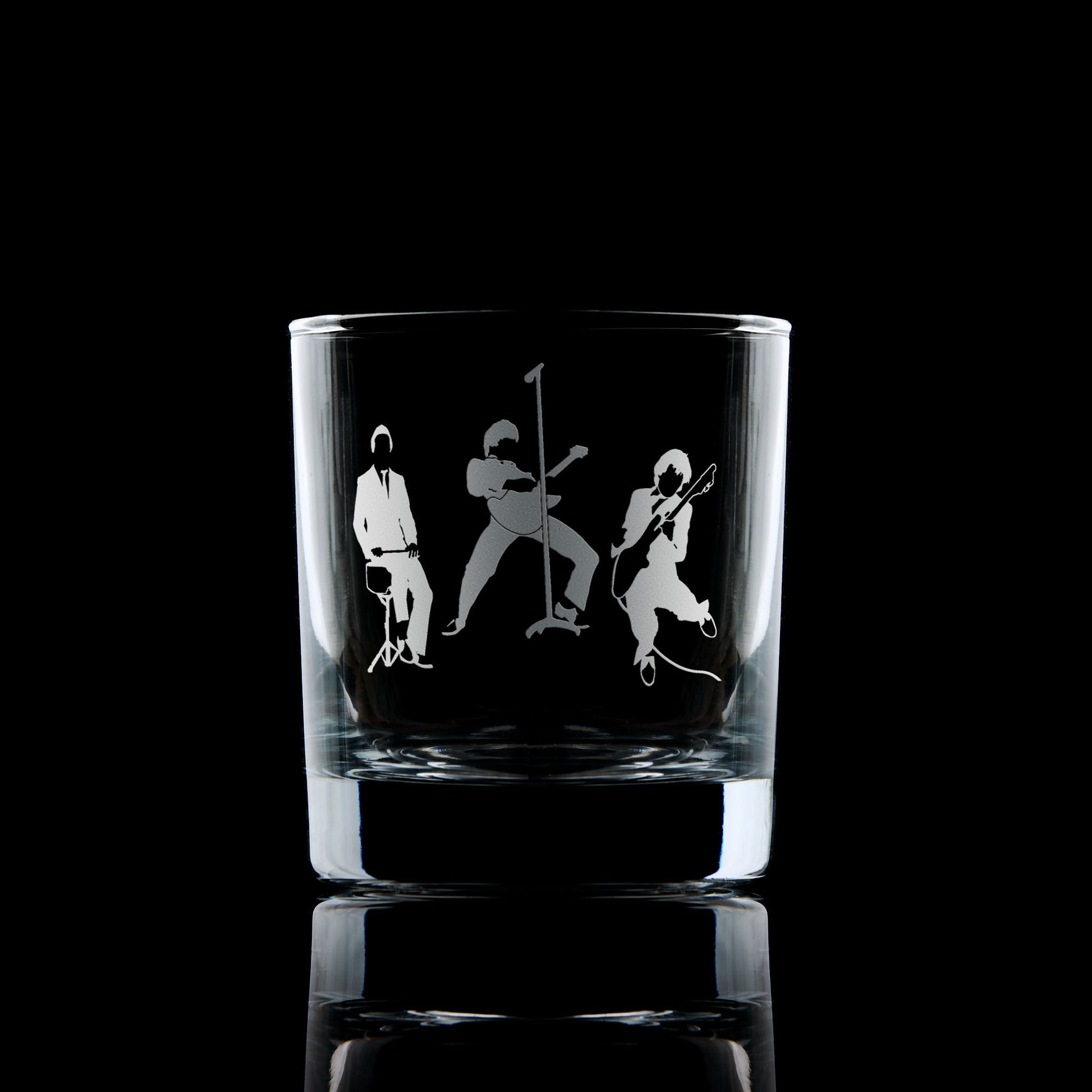 Engraved whisky glass featuring a silhouette of The Jam in a mod revival-inspired design – guitar, bass, and drums