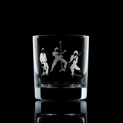 Engraved whisky glass featuring a silhouette of The Jam in a mod revival-inspired design – guitar, bass, and drums