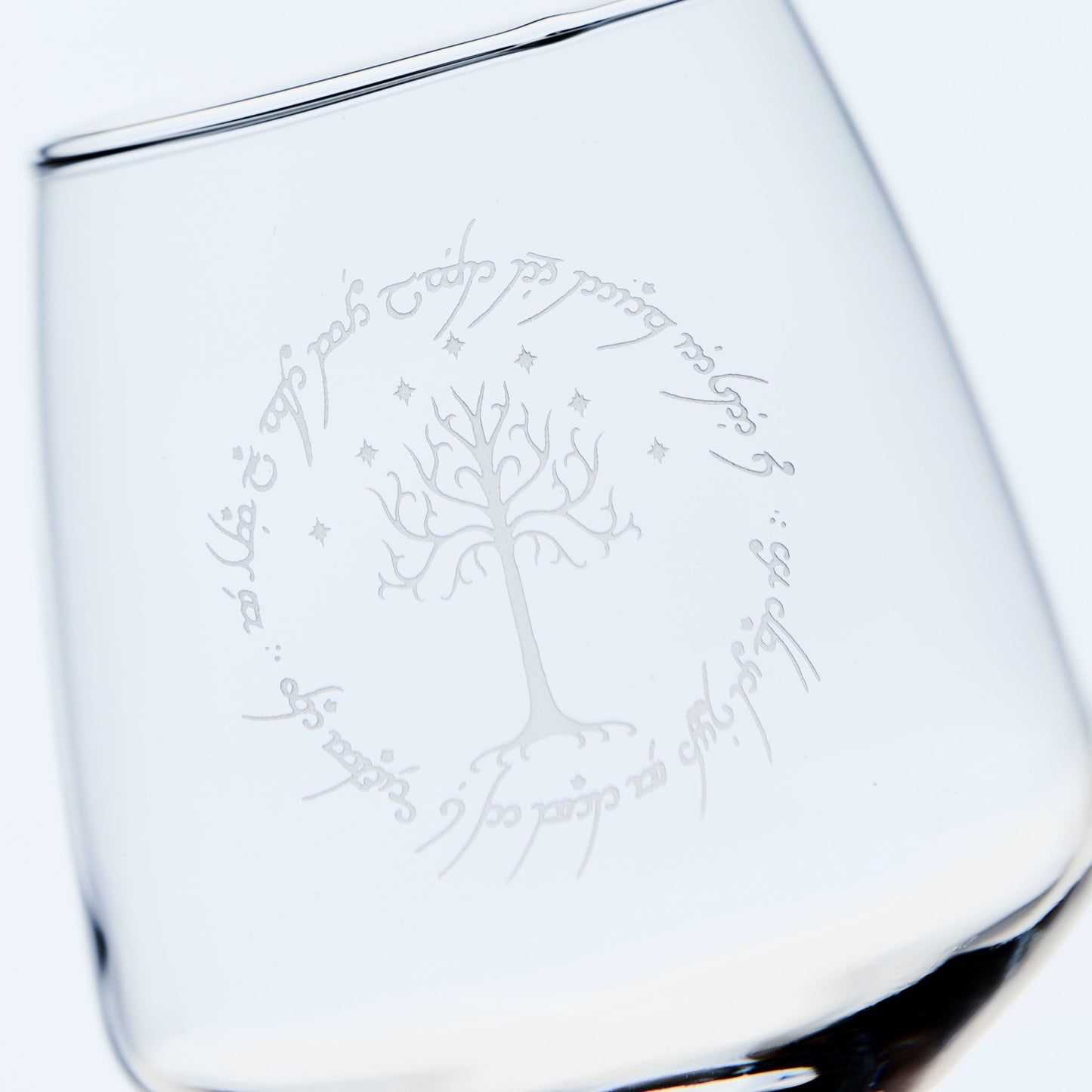 engraved wine glass with gondor's white tree, stars and elvish text