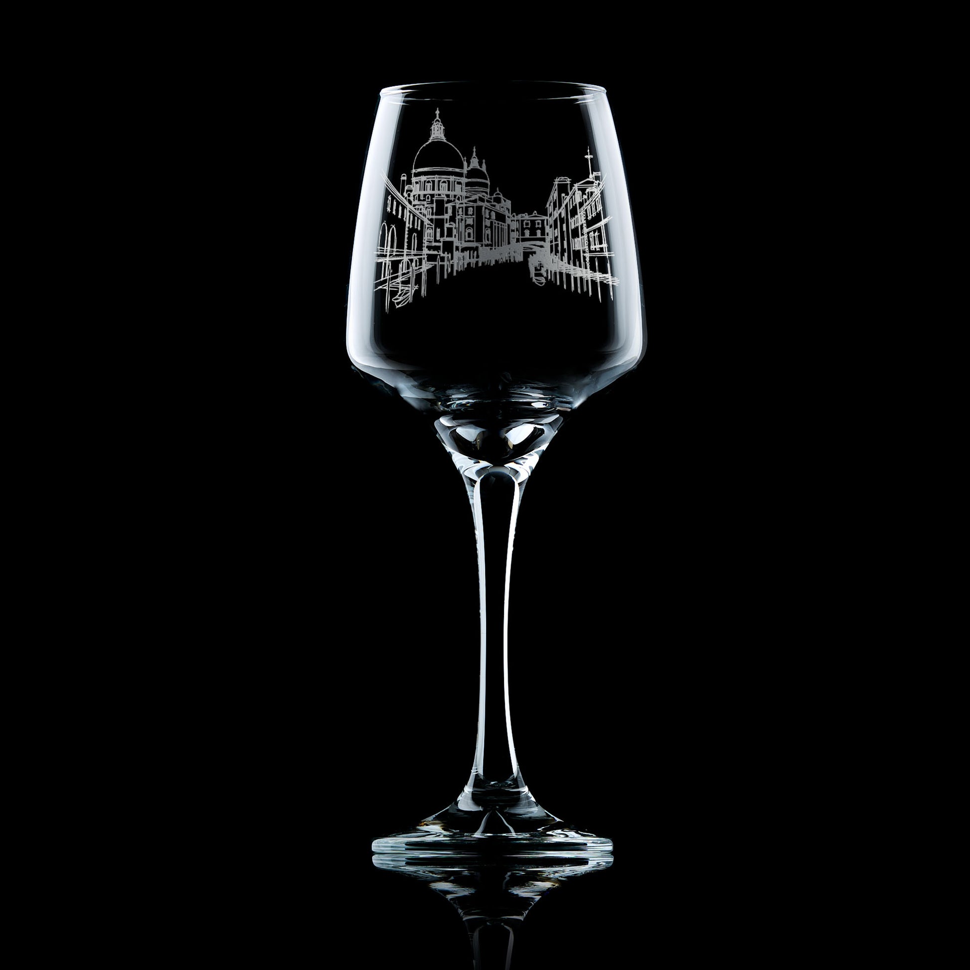Engraved wine glass featuring the skyline of Venice with domes, canals, and bridges