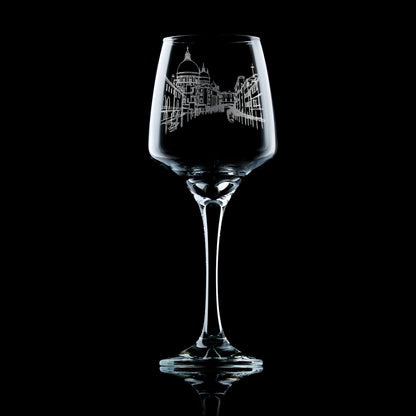 Engraved wine glass featuring the skyline of Venice with domes, canals, and bridges