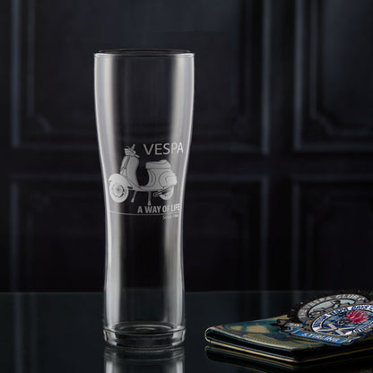 Pint glass engraved with a Vespa 50 Special scooter and 'A Way of Life' text on a dark background