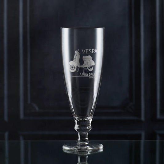 Stemmed beer glass engraved with Vespa 50 Special scooter and script logo — hand-engraved in our Fife studio.