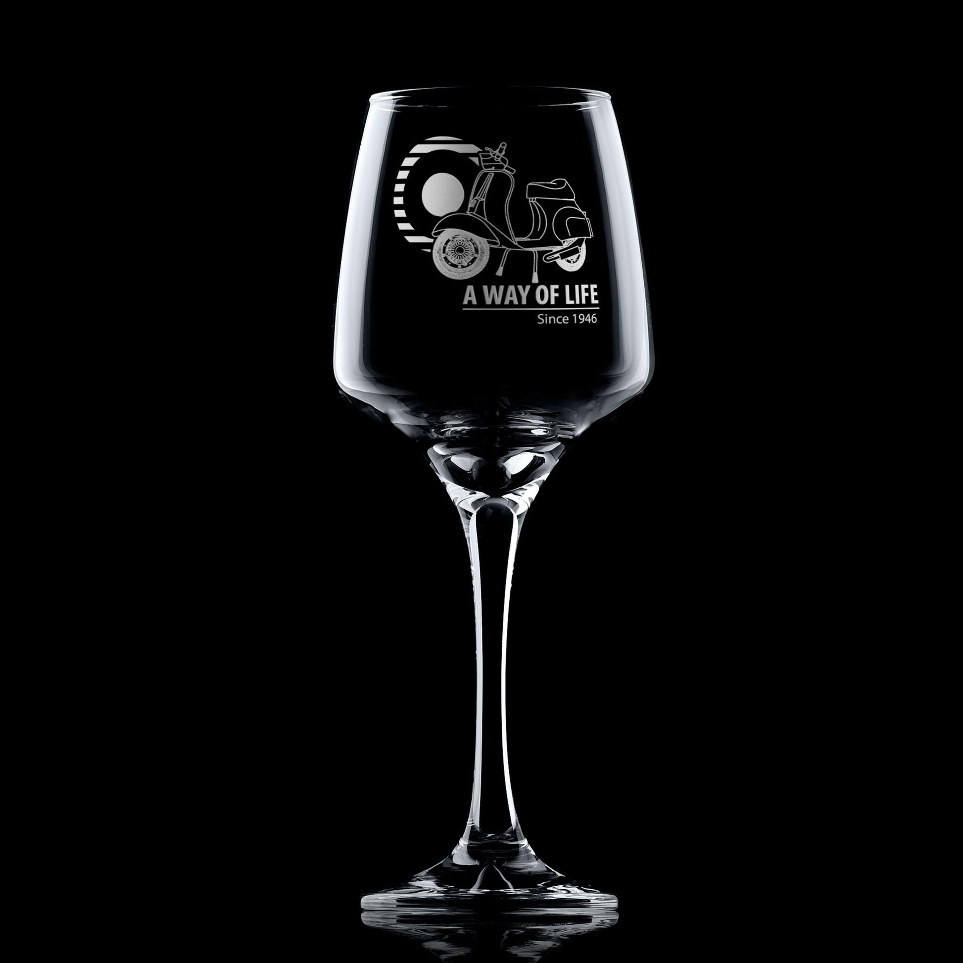 Personalised wine glass engraved with Vespa 50 Special and Mod target design, shown on black background