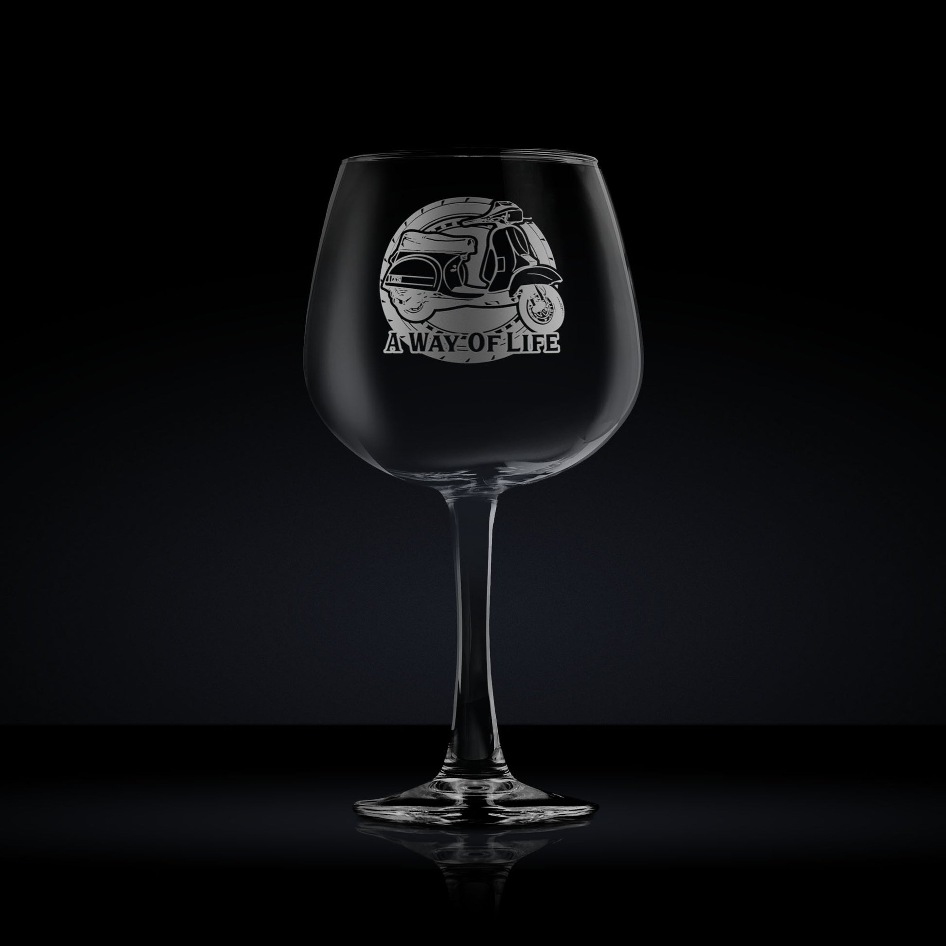 stemmed ballon gin glass engraved with a vespa T5 scooter