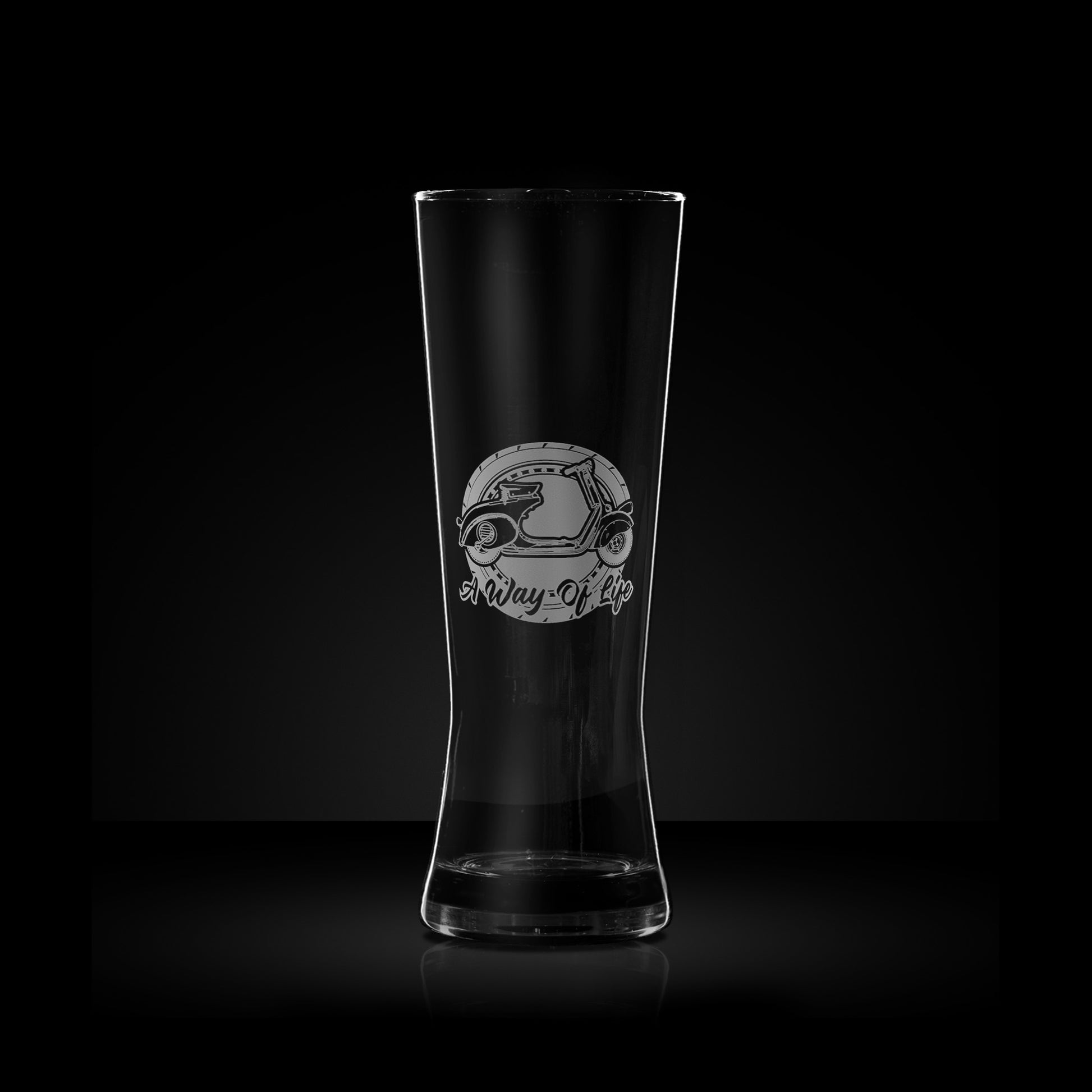 engraved pilsner pint glass featuring a vespa faro basso scooter design