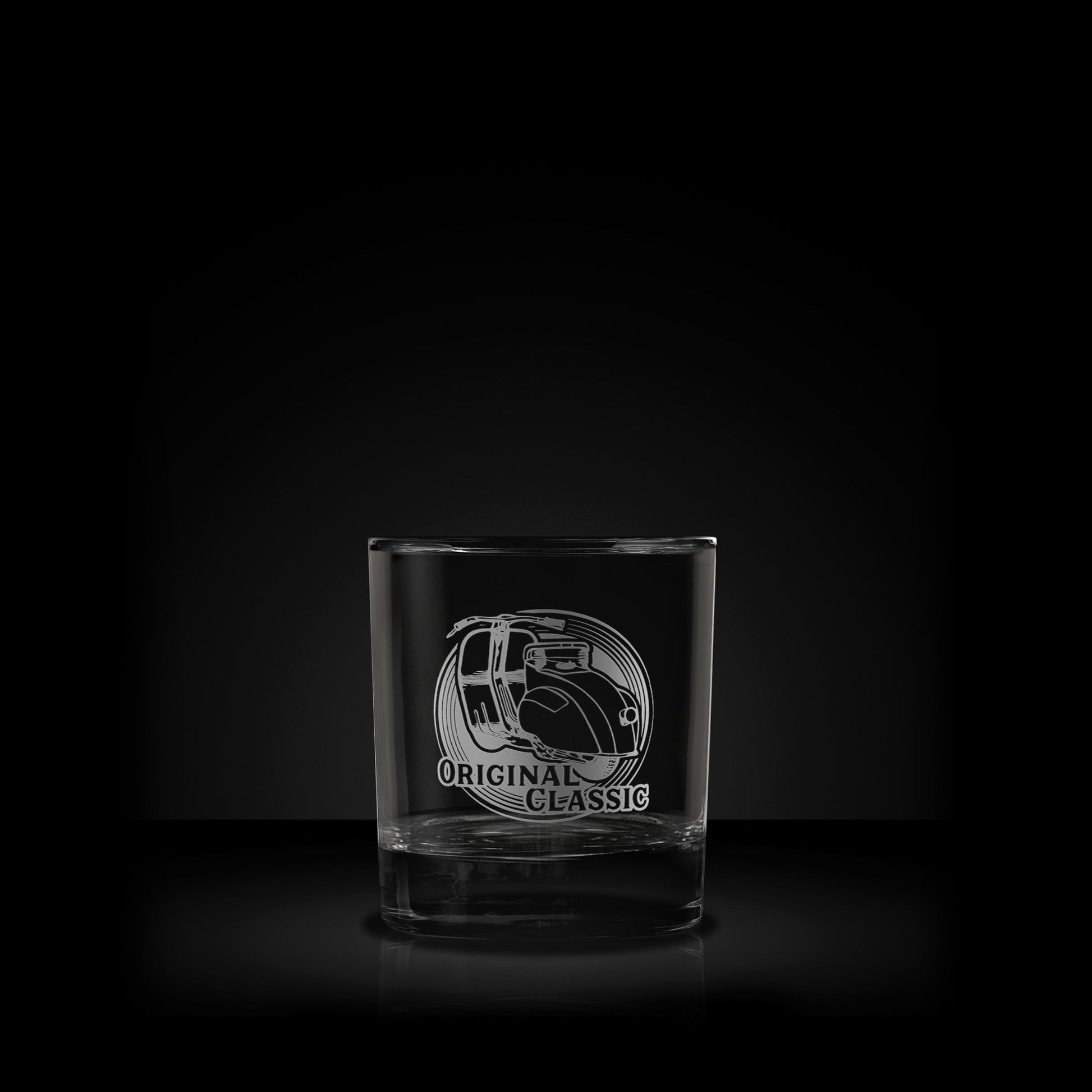 whisky glass engraved with a vintage farro basso vespa scooter