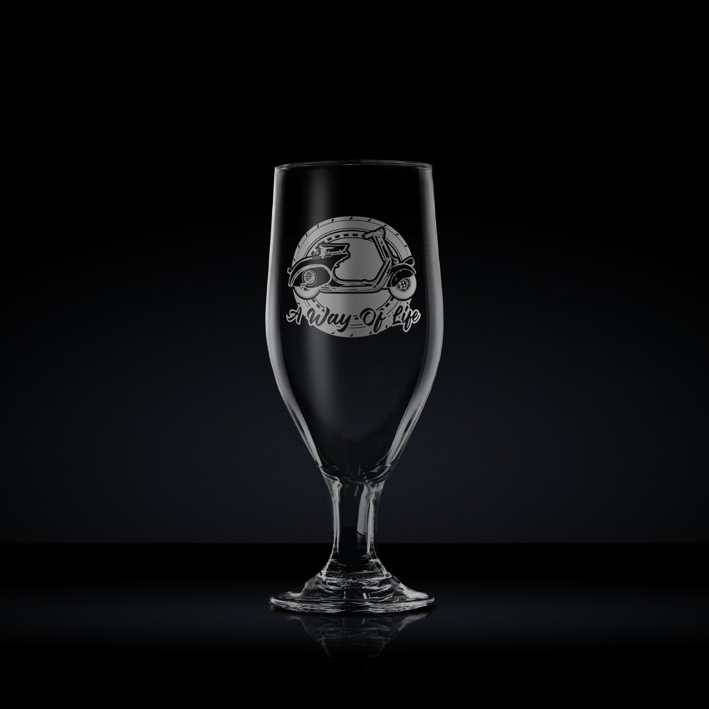 Engraved stemmed beer glass etched with a vintage vespa faro basso scooter